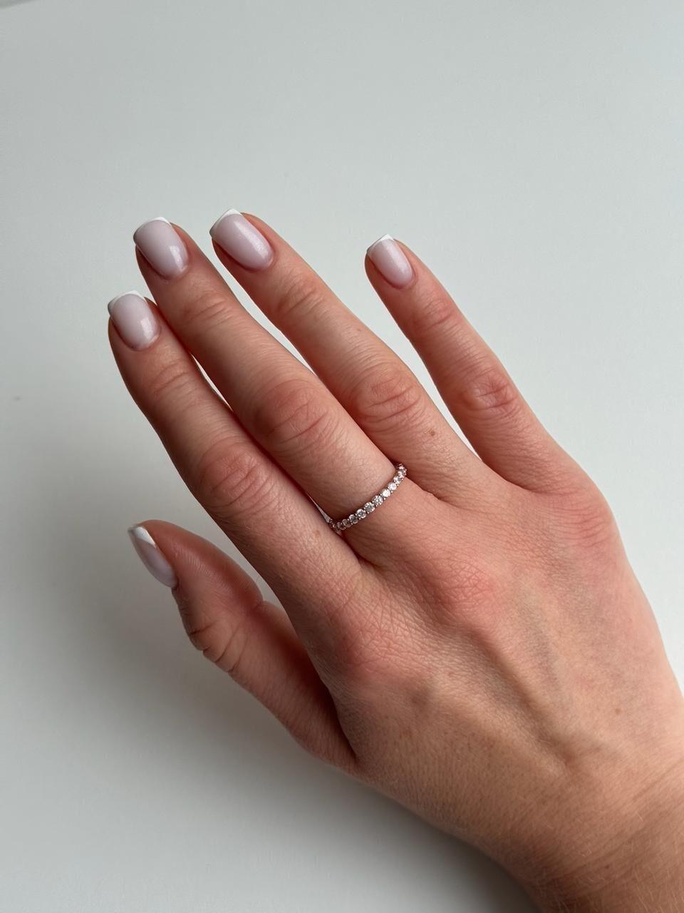 Зображення Женское серебряное кольцо с фианитами по кругу в позолоте при наведенні